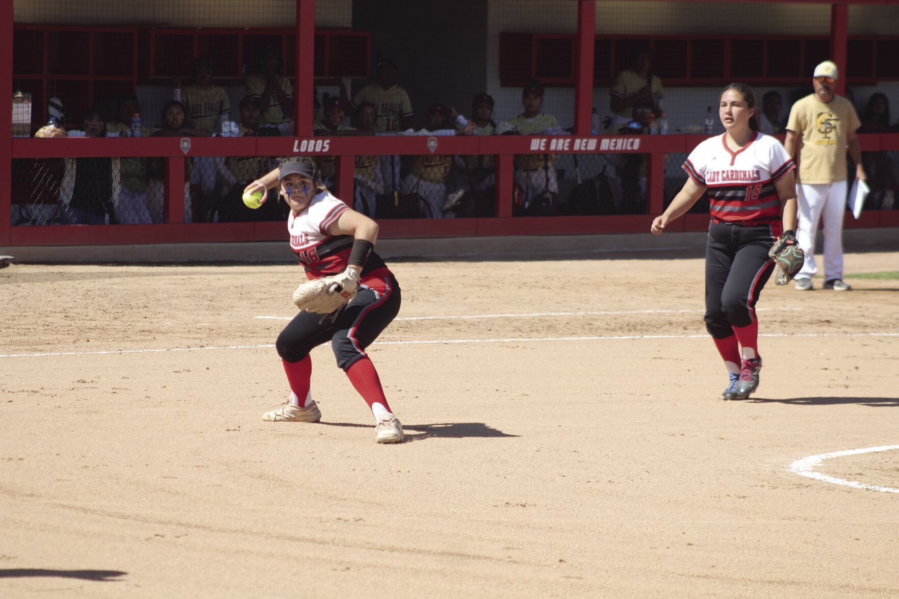 Arianna Sanchez throws to first